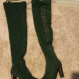 Thigh high peep toe boot